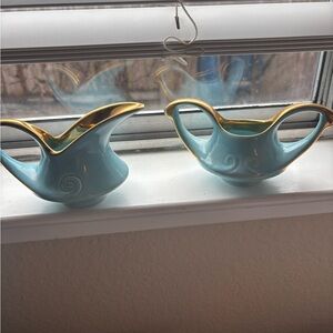 Elegant Blue and Gold Ceramic Pitchers